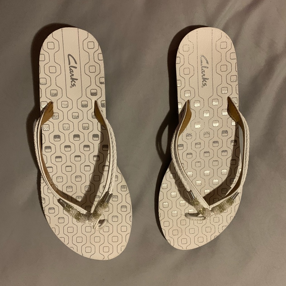 Clark’s White Flip Flops